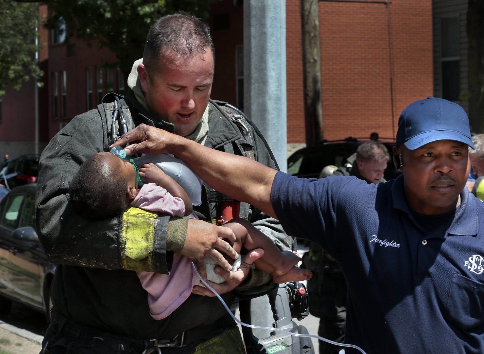 Firefighters rescue four children from burning apartment
